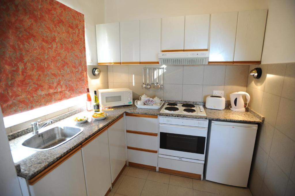 Club Salina Wharf Aparthotel Qawra Szoba fotó