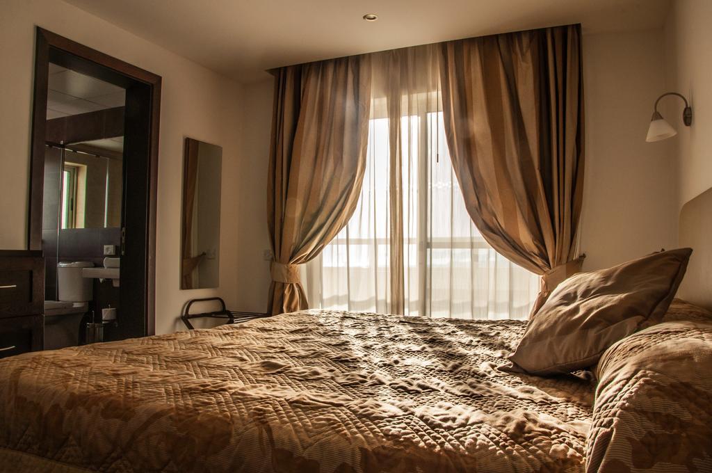 Club Salina Wharf Aparthotel Qawra Szoba fotó